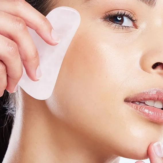 The Benefits of Using a Gua Sha Crystal Tool: A DollsFace Mindfulness Beauty Approach